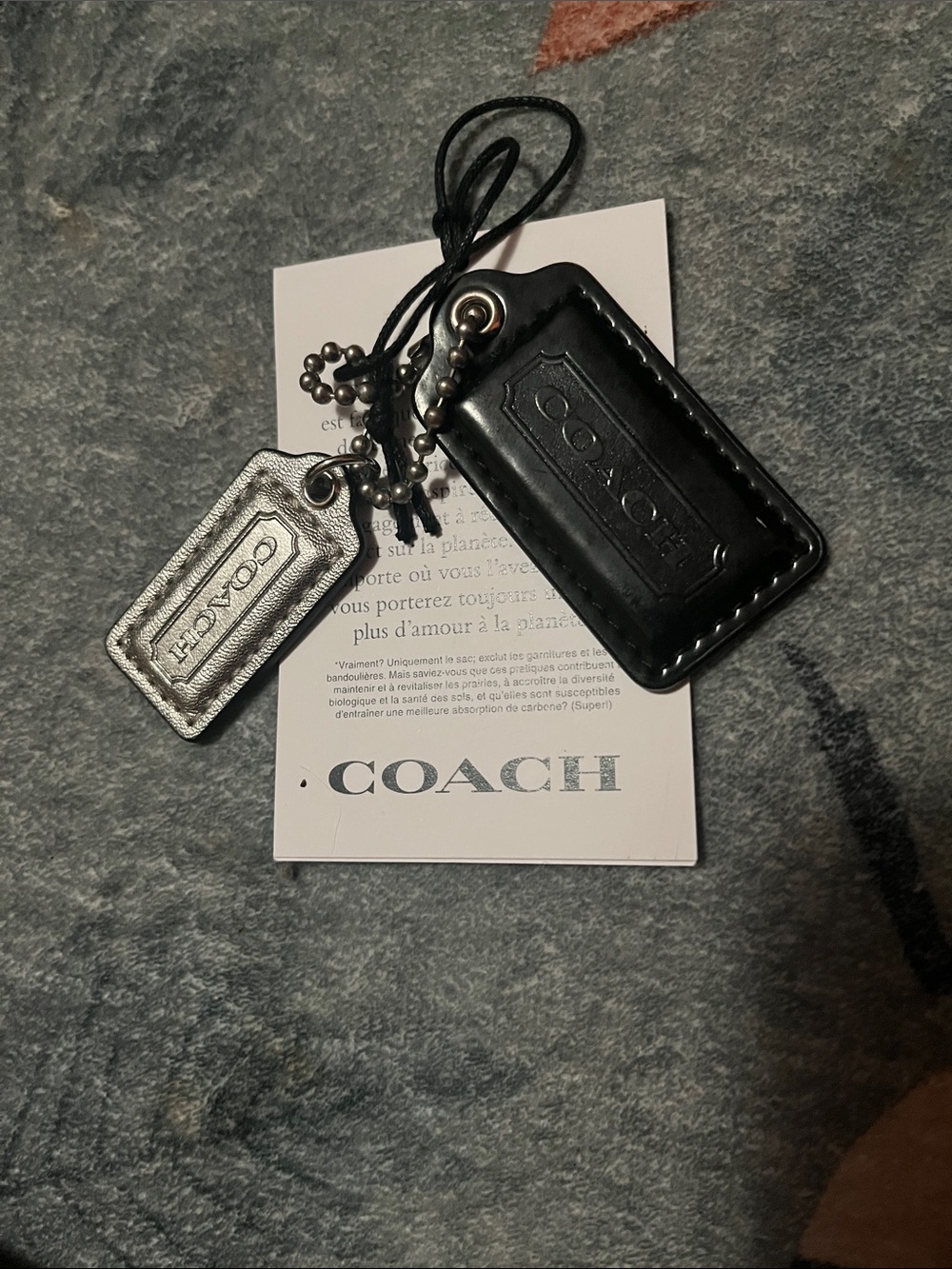 Coach Black Leather and Silver Metallic Tag Keychain Set